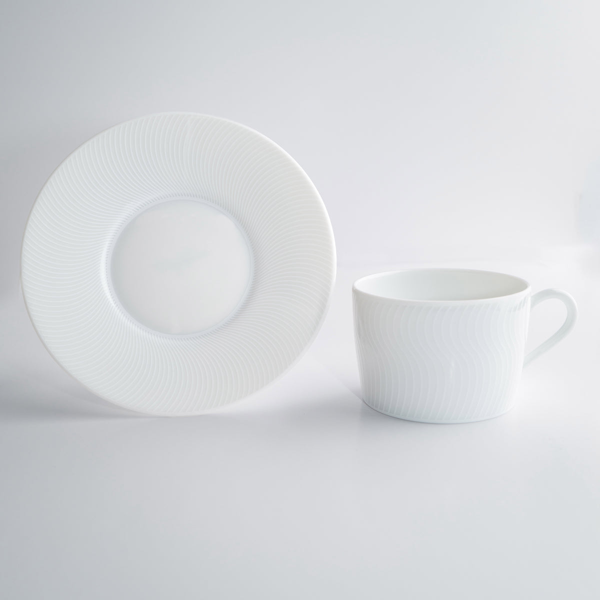 Tasse à thé avec la soucoupe - Illusion Blanche